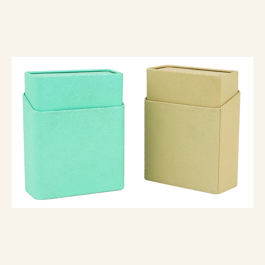 Mint and sand coloured personal care tins