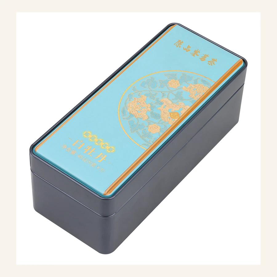 Blue and gold wellness product tin